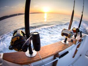 Rods and Reels on a charter boat, heading out to sea.