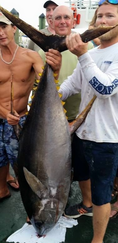 fishermen with yellow fin tuna